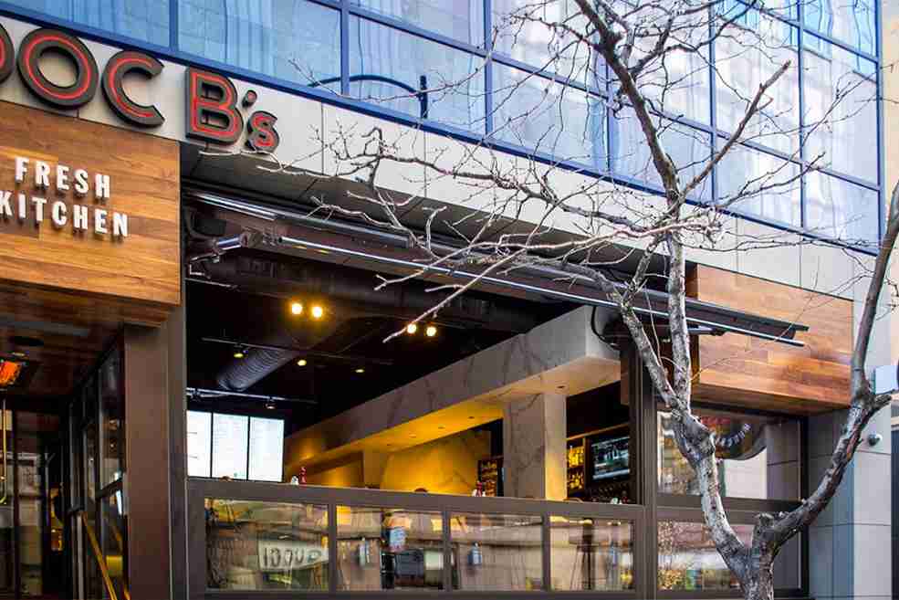 glass designer hydraulic doors on restaurant
