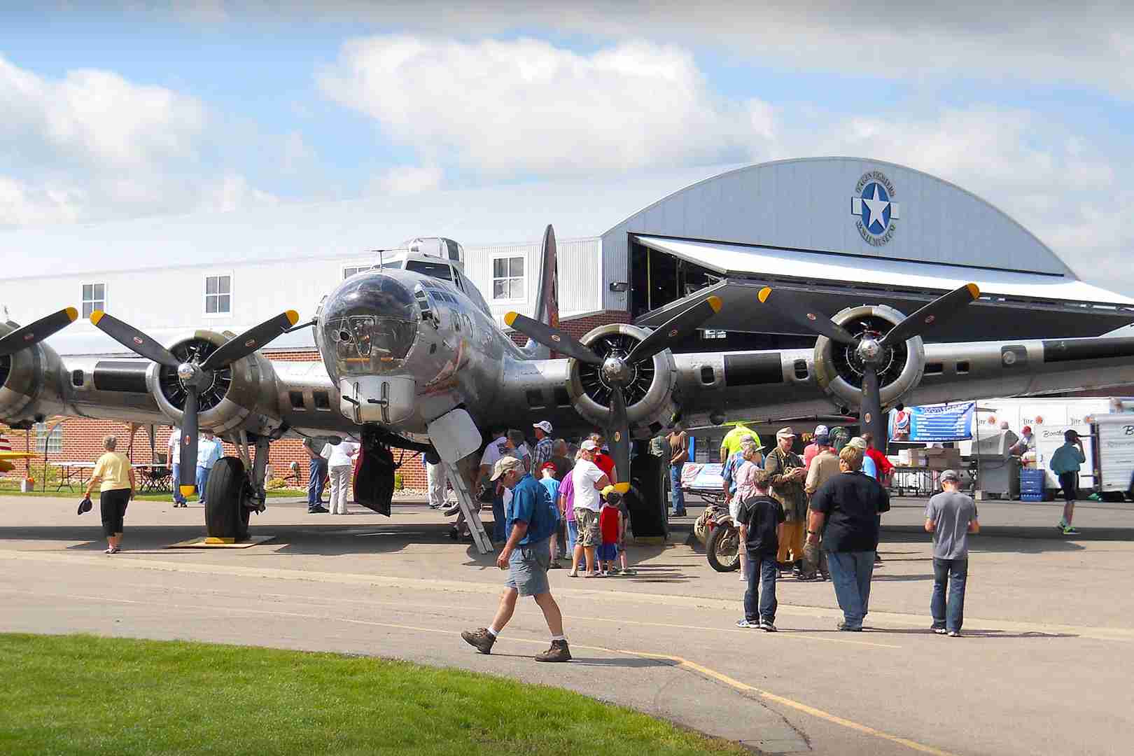large plane bifold door at an airshow